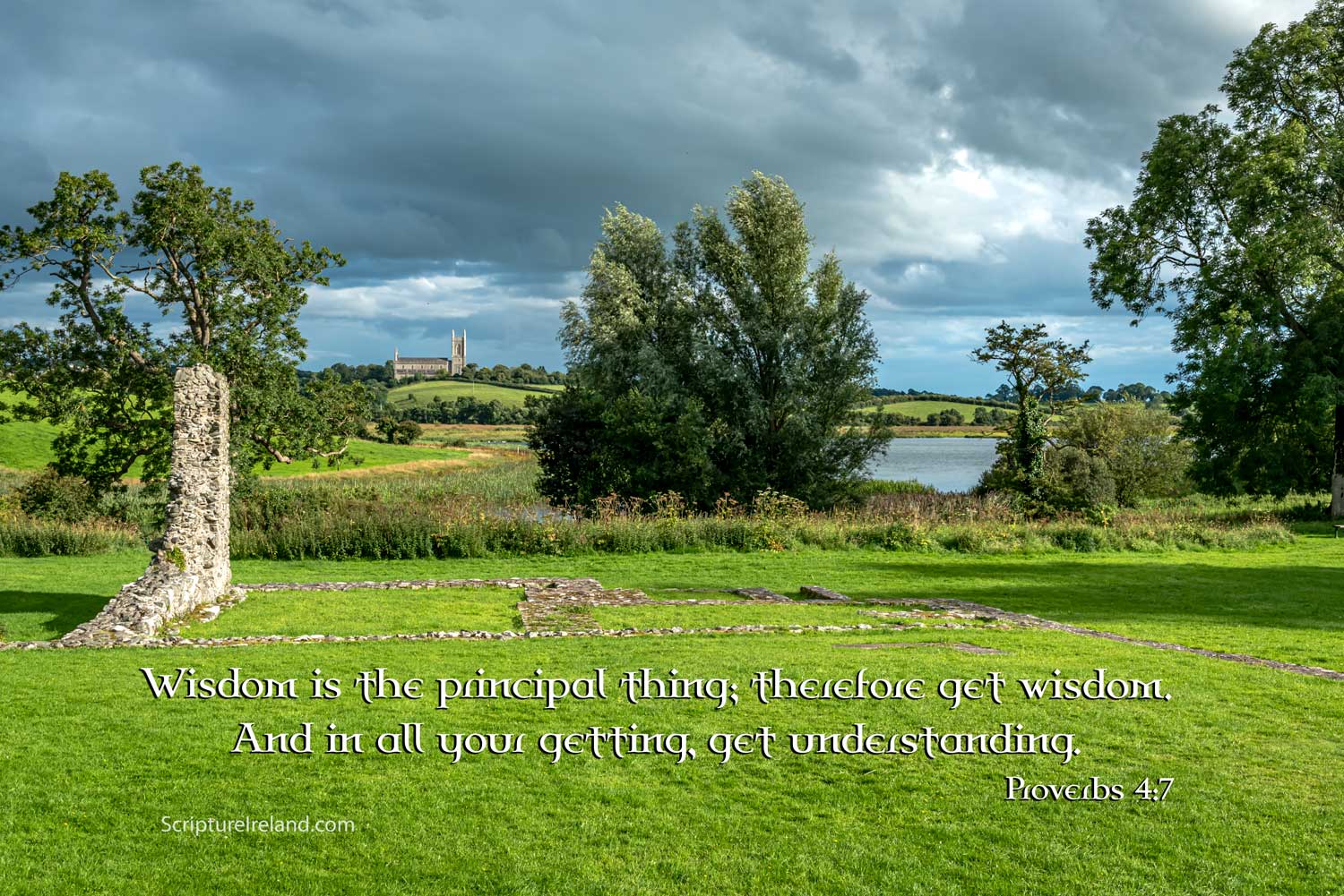 A distant Down Cathedral, St Patrick's resting place, as seen from the grounds of Inch Abbey, Downpatrick, County Down